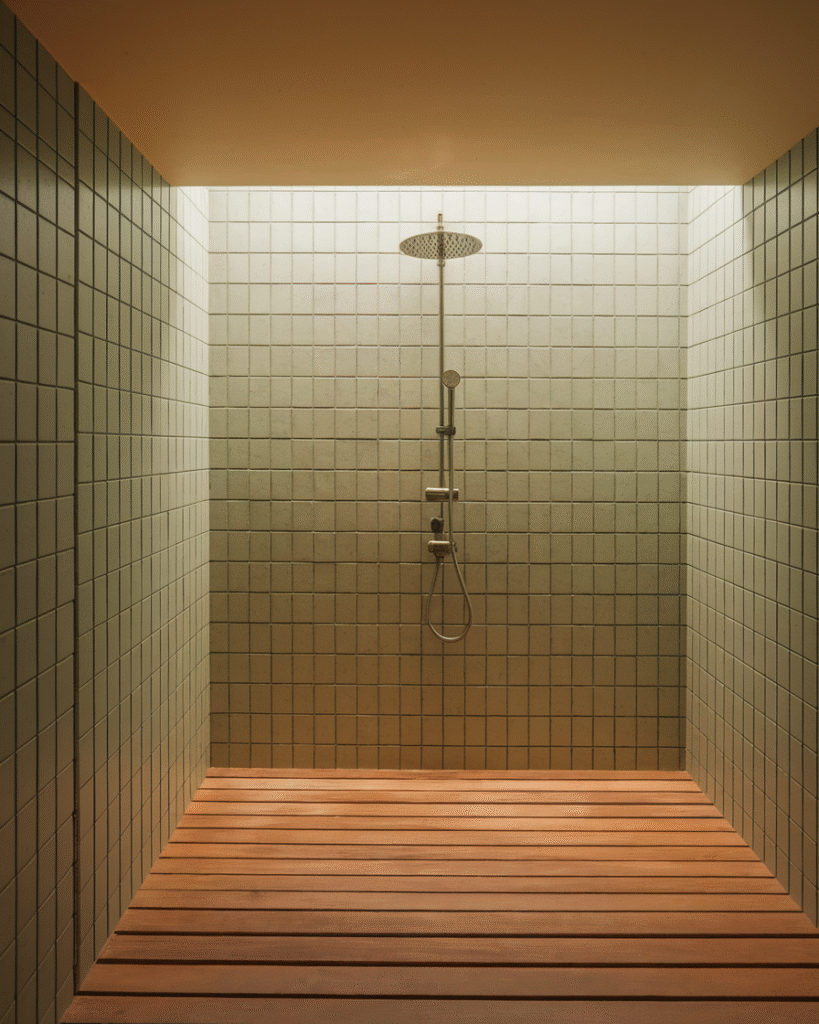 0008_2_in-a-warmly-lit-bathroom-a-feature-wall-_rgbo2MZhTZugX_eZ5RDMDQ_6uEETqquRcWTM1BF9OY0SQ